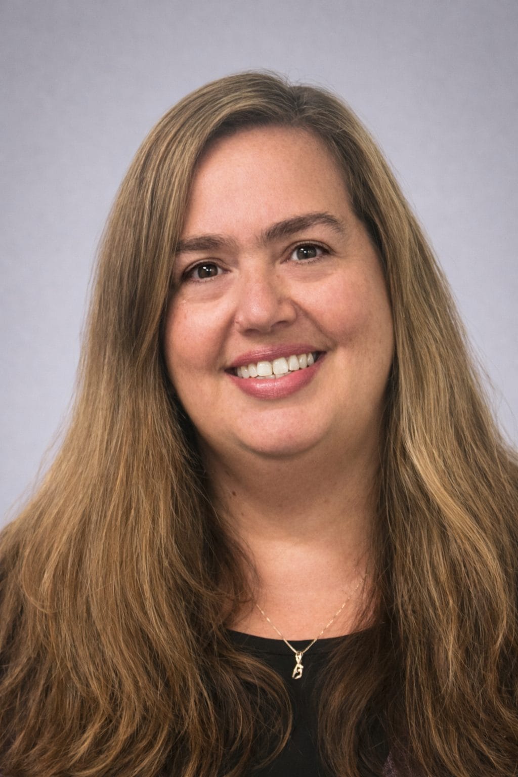 Photo of Dawn Belfus - Vice President of Data Services at the DCRB.